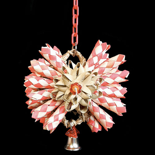 A double sided shredding toy made with bamboo shredders and palm leaf bows on a mini seagrass mat. Hangs on plastic chain with a nickel plated bell and charms on the bottom. Designed for small to intermediate sized birds. Available in assorted colors.