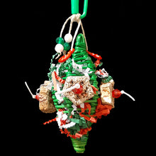 Load image into Gallery viewer, Stuffed full of crinkle cut paper with mahogany chunks, little beads and charms, this festive vine Christmas &quot;cracker&quot; is a perfect foraging toy for small birds! Hide special treats inside to keep your bird busy. This toy has no metal parts.  Measures approx 3&quot; by 6-1/2&quot; including link.
