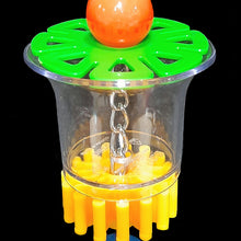 Load image into Gallery viewer, A clear acrylic cup with acrylic beads and a spinning gear hanging on nickel plated chain. Foraging stimulates natural behavior by making your bird work for its food! Be creative and hide your bird&#39;s favorite treats in shredded paper and stuff them into this cup. Designed for small to intermediate sized birds. Comes in assorted colors.  Measures approx 2-1/2&quot; by 8&quot; including link (cup measures 2&quot; by 2-1/2&quot; at the top).
